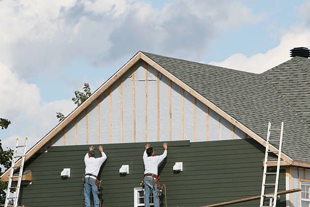 Professional Emergency Siding Repair technician working in Greenville, NC
